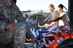 Washington National Guard soldiers prepare helicopter for wildfires
