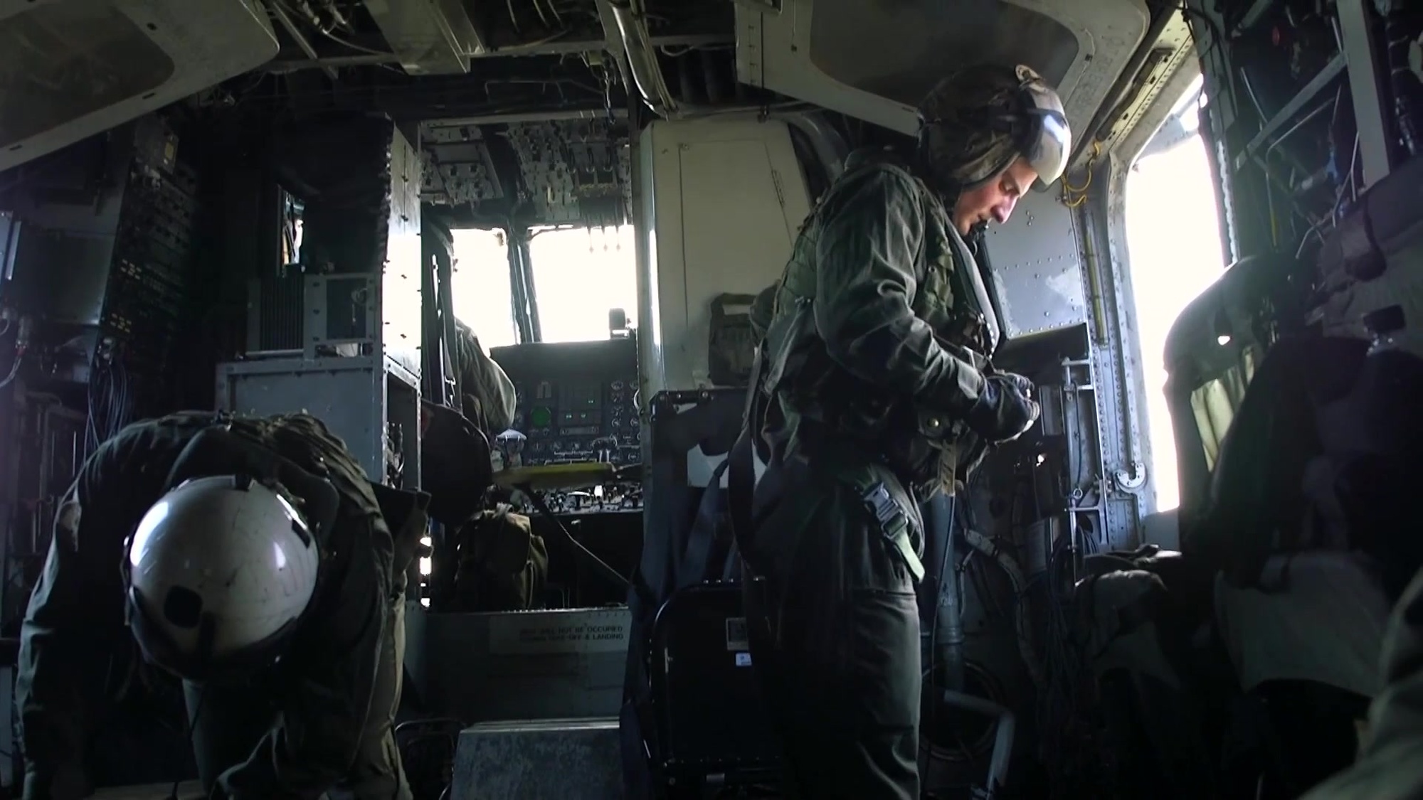 Marines with the 31st Marine Expeditionary Unit&#39;s Maritime Raid Force perform Helocast training at Kin Blue Beach, Okinawa, Japan, July 31, 2018. During Helocast, a Combat Rubber Raiding Craft is launched from the rear of a rotary-wing aircraft, followed by Marines and Sailors who jump from the aircraft and board the CRRC to perform amphibious reconnaissance missions. The 31st MEU, the Marine Corps’ only continuously forward-deployed MEU, provides a flexible force ready to perform a wide range of military operations (U.S Marine Corps Motion Imagery by Lance Cpl. Angelo Garavito)