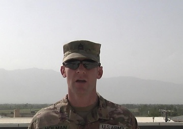 Sgt. 1st. Class Gregory Holman sends a back to school greeting