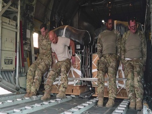 C-130 Hercules flight engineer boosts morale baking