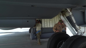 A KC-135 Stratotanker refuels F-15