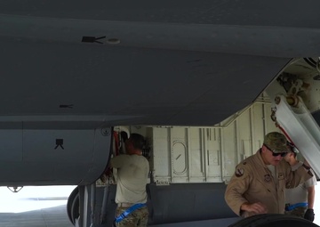 A KC-135 Stratotanker refuels F-15