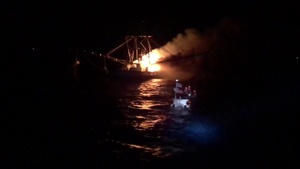 Coast Guard rescues 3 in response to emergency distress signal activation near Port Isabel, Texas