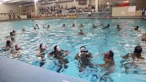 Marines teach water survival to collegiate swimmers