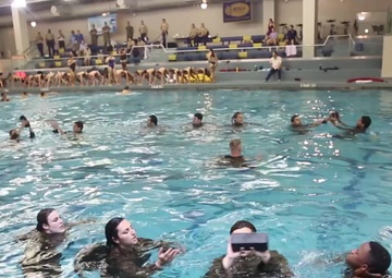 Marines teach water survival to collegiate swimmers