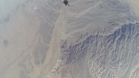 Reconnaissance Marines glide through the air during Exercise Desert Canopy