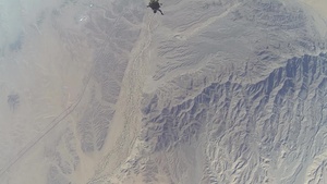 Reconnaissance Marines glide through the air during Exercise Desert Canopy