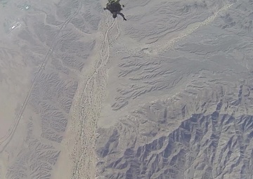 Reconnaissance Marines glide through the air during Exercise Desert Canopy