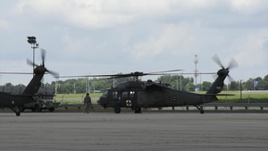 B-Roll Black Hawks Landing on Flight line