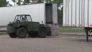 North Carolina Guardsmen distribute food and water to local residents