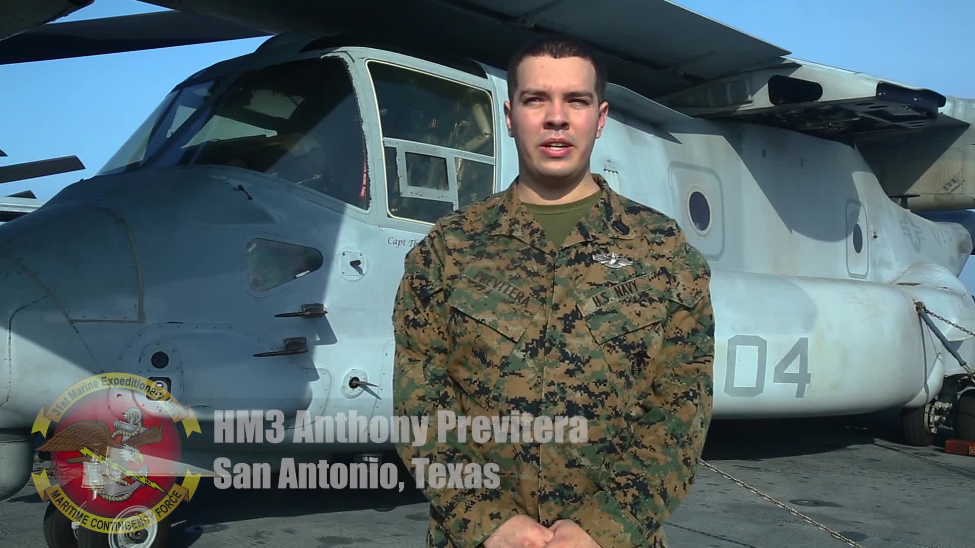 Petty Officer 3rd Class Anthony Previtera, a hospital corpsman with the 31st Marine Expeditionary Unit, greets the New Orleans Saints before the start of the season aboard the amphibious assault ship USS Wasp (LHD 1), underway in the South China Sea, Sept. 30, 2018. Previtera, a native of San Antonio, Texas, graduated from William Howard Taft High School in June 2014 before enlisting in the United States Navy in December 2014. (U.S. Marine Corps video by Lance Cpl. Alexis B. Betances/Released)