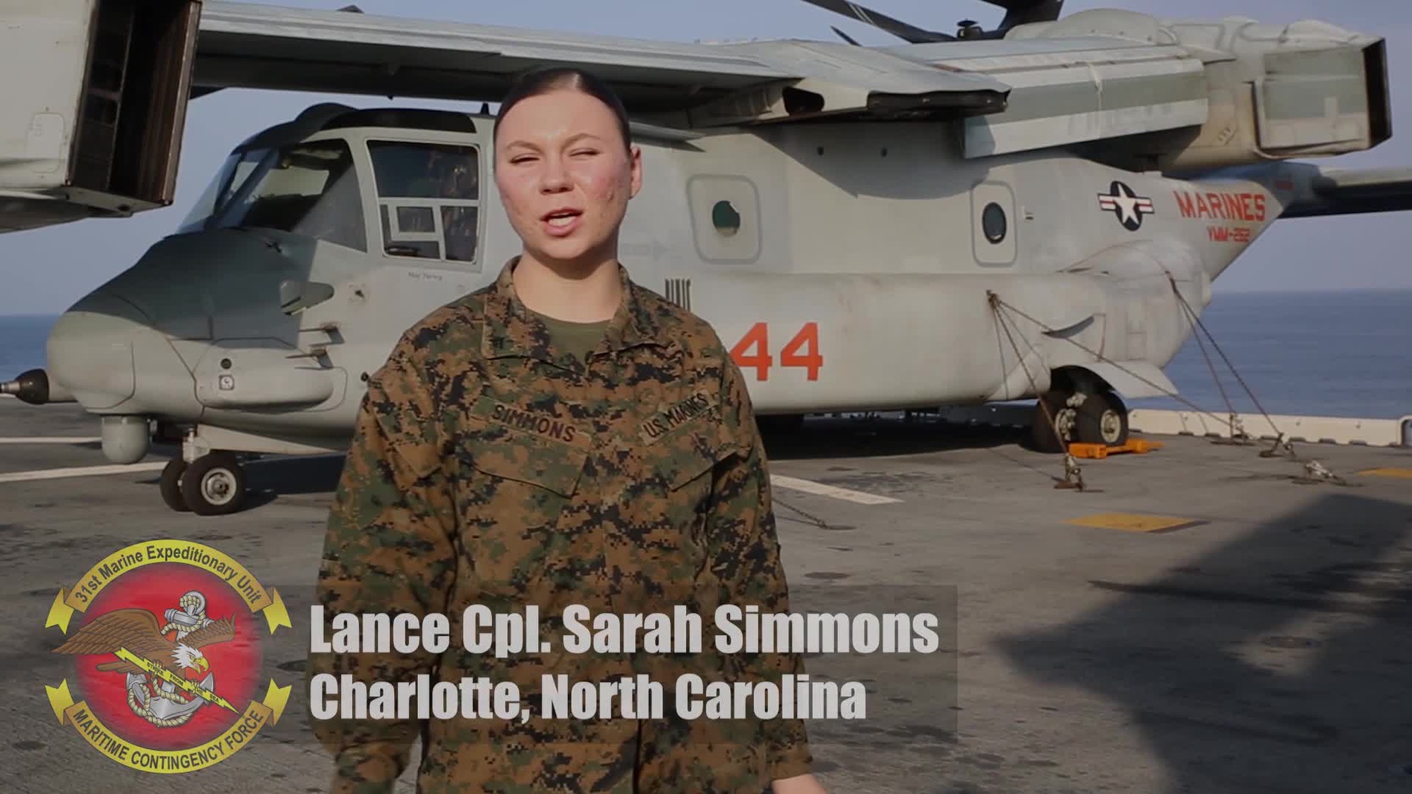 Lance Cpl. Sarah Simmons, an administrative clerk with the 31st Marine Expeditionary Unit greets the Pittsburgh Steelers before the start of the season aboard the amphibious assault ship USS Wasp (LHD 1), underway in the South China Sea, Sept. 30, 2018. Simmons, a native of Charlotte, North Carolina, graduated from East Gaston High School in June 2017 before enlisting in July 2017. (U.S. Marine Corps video by Lance Cpl. Hannah Hall/Released)