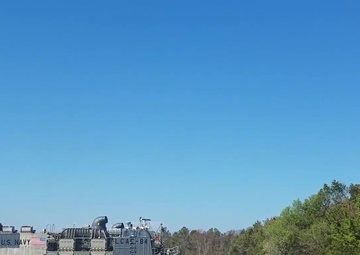 LCACs, LAVs and HMMWVs onload and offload of Onslow Beach for TCAT