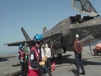 Fighter jets join forces with British aircraft carrier to make history