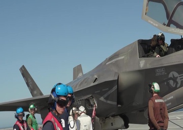 Fighter jets join forces with British aircraft carrier to make history