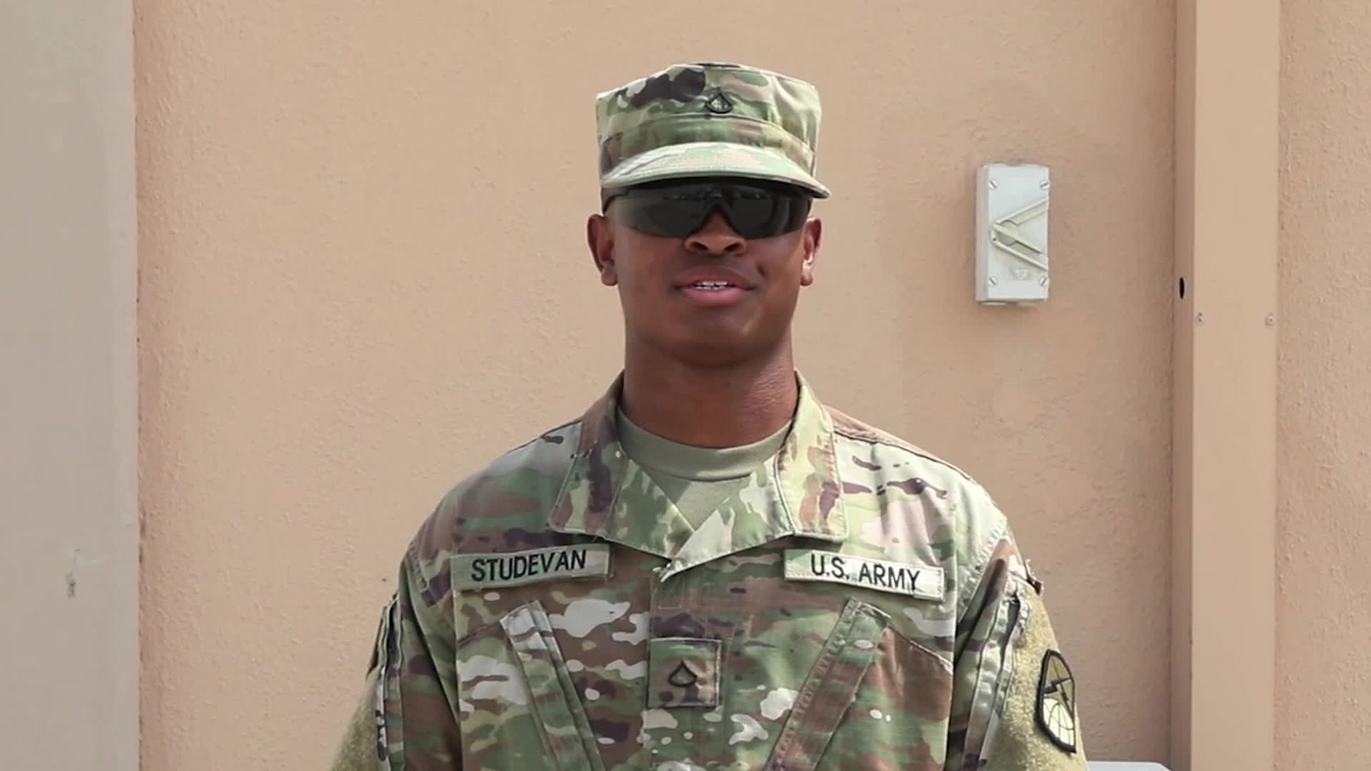 PFC Studevan stationed at Camp As Sayliyah, Qatar sends his support to the U.S. Army Black Knights football team-- Go Army, Beat Navy!