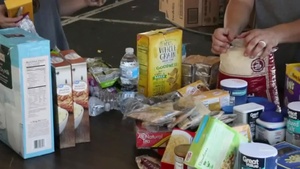 BROLL_ Community Volunteers mobilized to help with relief efforts at a point of distribution site in Panama City Beach
