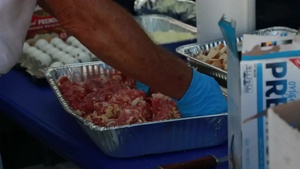 BROLL_ volunteers with Operation BBQ Relief prepares hot meals for hurricane survivors