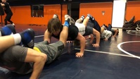 Wheaton College wrestlers endure leadership composition exercise