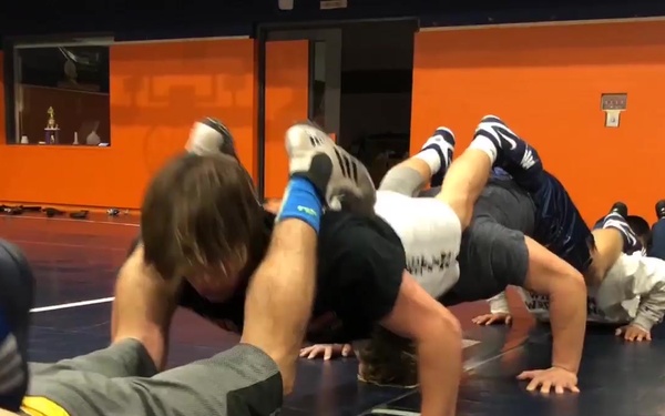 Wheaton College wrestlers endure leadership composition exercise
