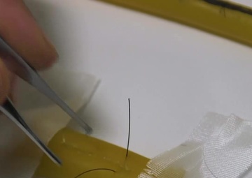 Corpsmen with BLT 2/5 refine suture training