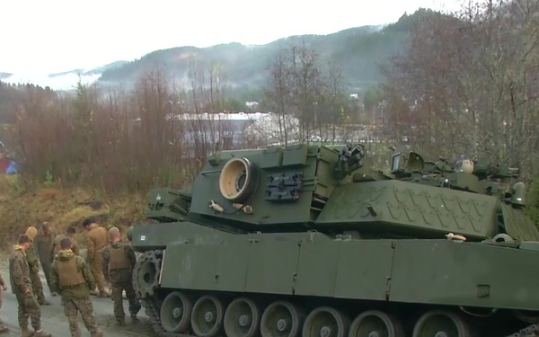 Trident Juncture 18, 26 OCT, 2nd Tank Battalion, and Combat Logistics Battalion, 2nd Marine Division, recover a M1150 Assault Breacher Vehicle with M1A2 Abram tanks near Storas.