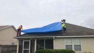 USACE Contractors Install Blue Roof