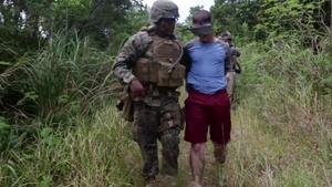 Patrol, detain, and escort: Law Enforcement Marines simulate hostage handling