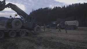Marines with CLB 24 Unload a Light Capability All Terrain Forklift in Fossmoan, Norway