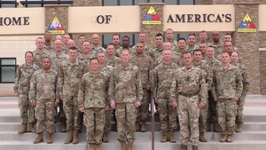 1st Armored Division staff gives a shout out to the West Point Black Knights