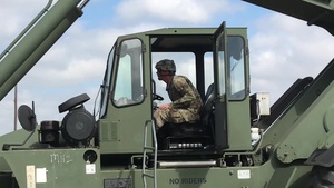 Soldiers from 887th Engineer Support Company conduct container movements