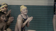 Swimmers from the Marine Corps Air Station Iwakuni Tsunami Youth Swim Team and the Iwakuni City Ocean Swim Team compete during a swim meet