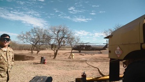 U.S. Army Soldiers Refuels a Blackhawk Helicopter