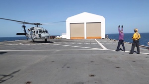 Helicopters Transport Patients to the USNS Comfort from Land-Based Medical Sites