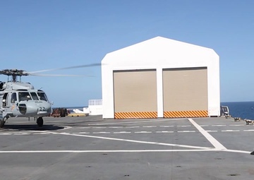 Helicopters Transport Patients to the USNS Comfort from Land-Based Medical Sites