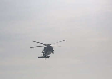 Helicopters Transport Patients to the USNS Comfort from Land-Based Medical Sites