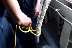 Sailors Handle Line Aboard USS Michael Monsoor