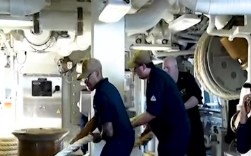Sailors Handle Mooring Line