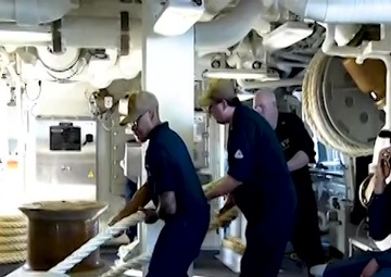 Sailors Handle Mooring Line