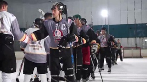 Service Members play Hockey