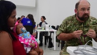 United Kingdom Personnel Support Enduring Promise Aboard USNS Comfort