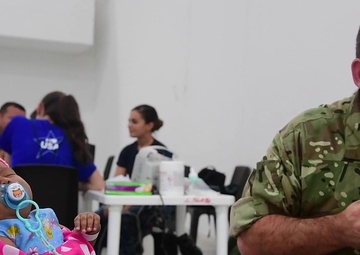 United Kingdom Personnel Support Enduring Promise Aboard USNS Comfort