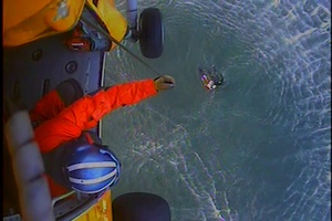 Distressed Surfers Assisted by Coast Guard Aircrews in Newport, Oregon, and Willapa Bay, Washington