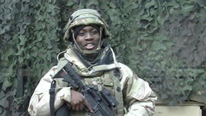 U.S. Army Pfc. Alimamy Sankoh gives a holiday shout out from Hohenfels, Germany