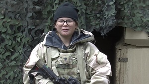 U.S. Army Spc. Rebecca Schaefer gives a holiday shout out from Hohenfels, Germany