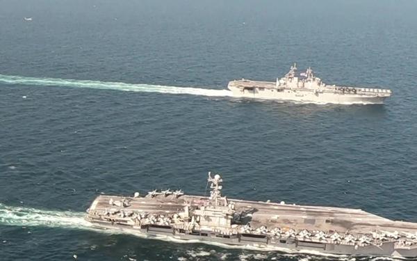 U.S. Navy Ships and aircraft of the John C. Stennis Carrier Strike Group and Essex Amphibious Ready Group conduct operations