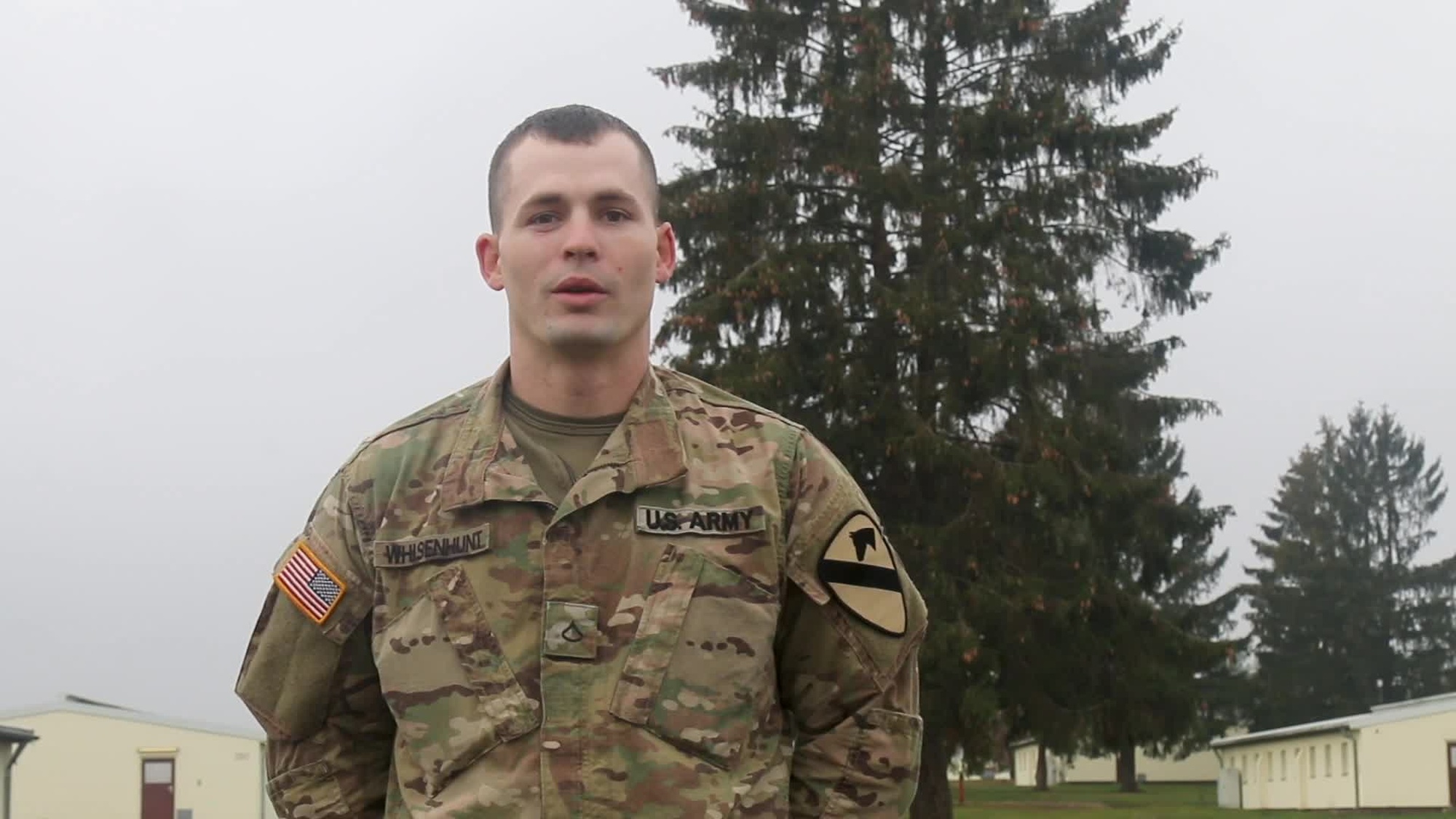 U.S. Army Pfc. Andrew Whisenhunt of 2nd Battalion, 12th Cavalry Regiment, 1st Armored Brigade Combat Team, 1st Cavalry Division gives a holiday shout out to friends and family in Atoka, Oklahoma.