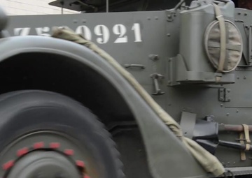 Bastogne reenactors and WWII vehicles in Motion