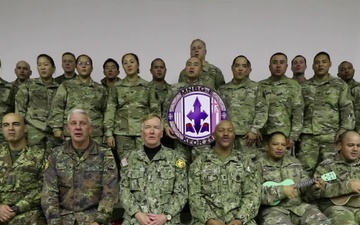 Admiral James Foggo sings Mele Kalikimaka with Soldiers in Kosovo