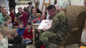 Santa Stomps to the Library
